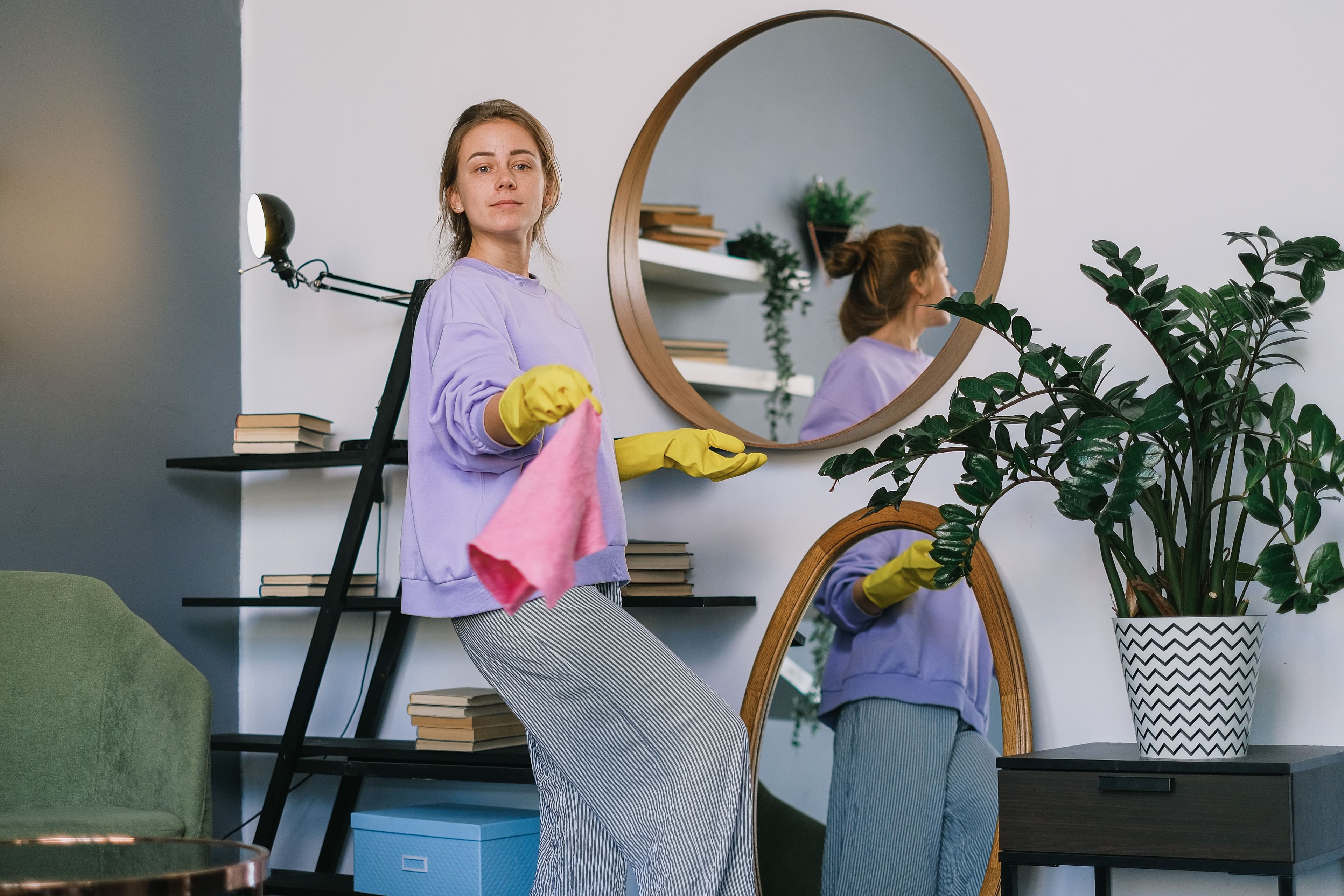 Cleaner in a domestic-style environment representing property cleaning support